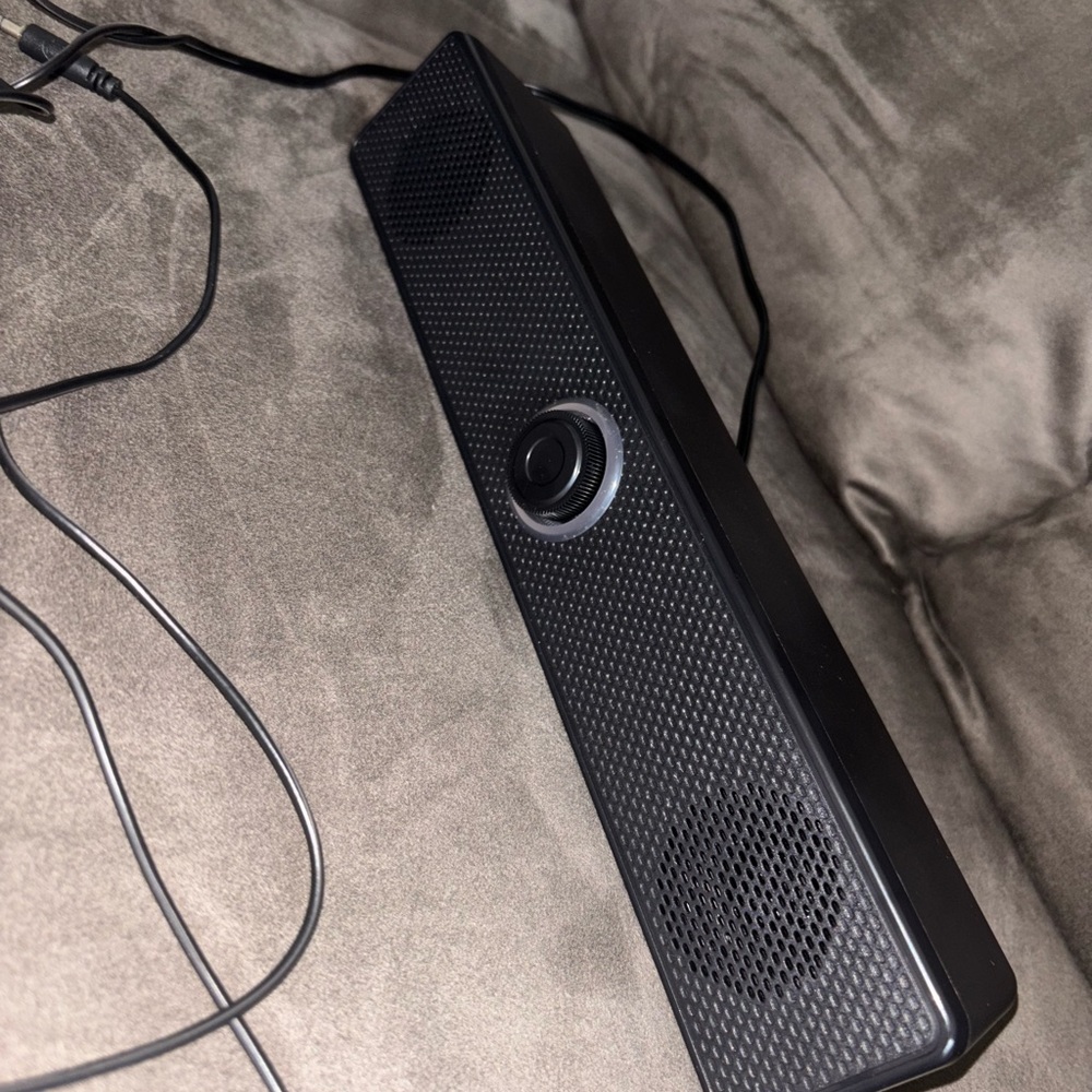 🔈Sleek Black Soundbar with Dual Speakers